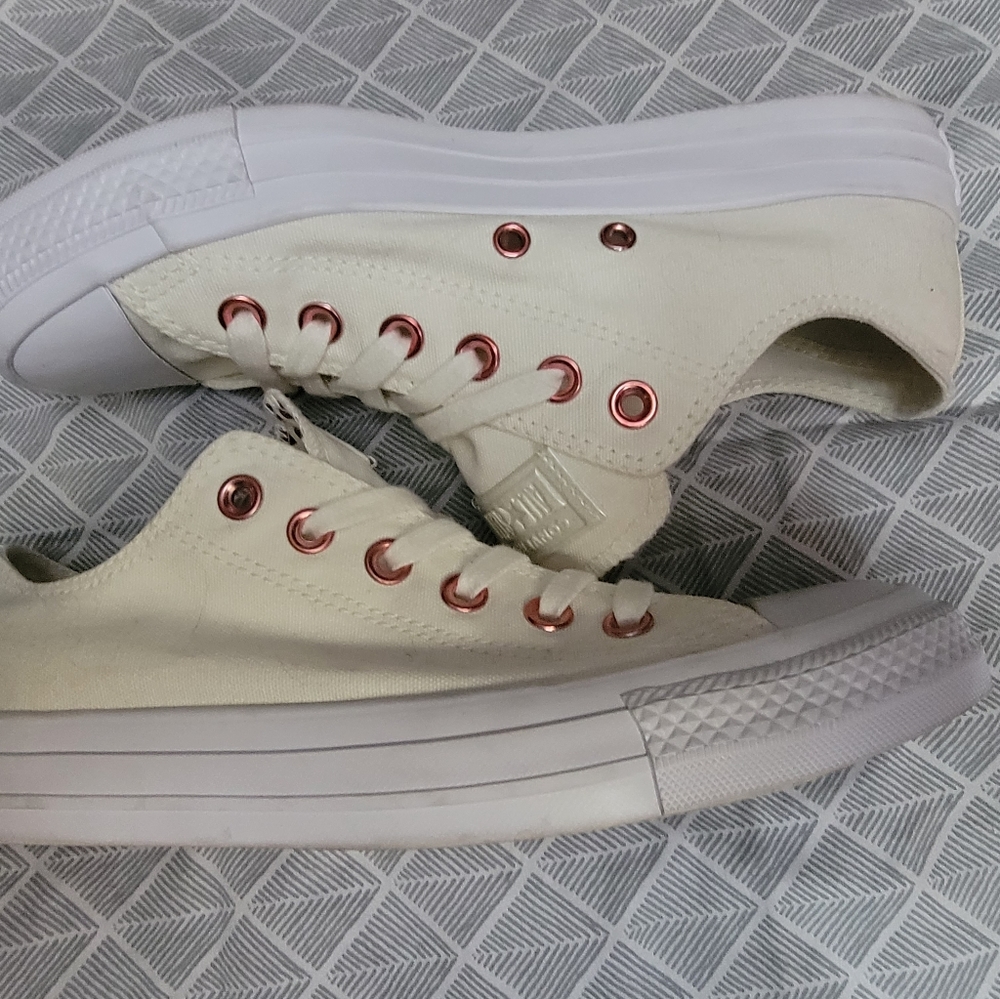 Off white Converse with pink metallic details